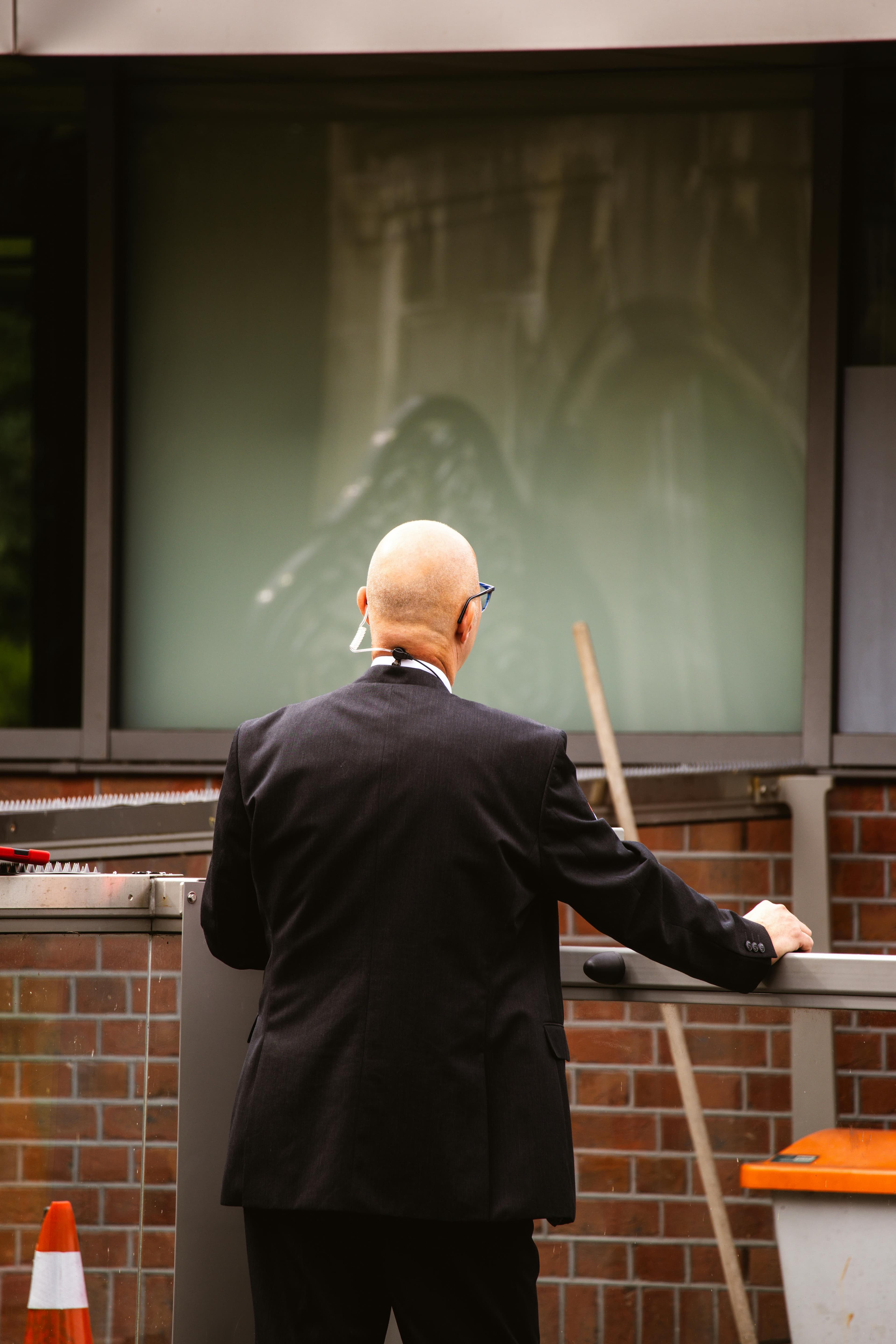 Professional event security overseeing an access point